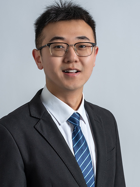 Portrait photograph of staff memeber, Jingxiao Wu